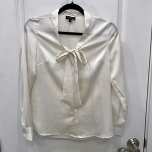 The limited silk tie blouse